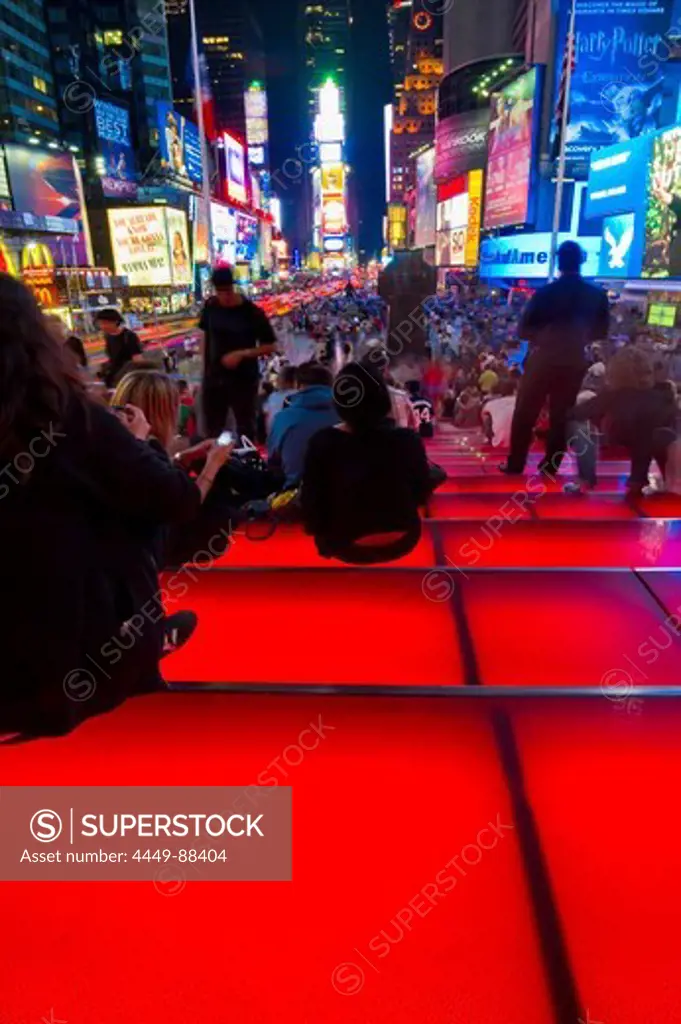 People at Times Square at night, Manhattan, New York, USA, America