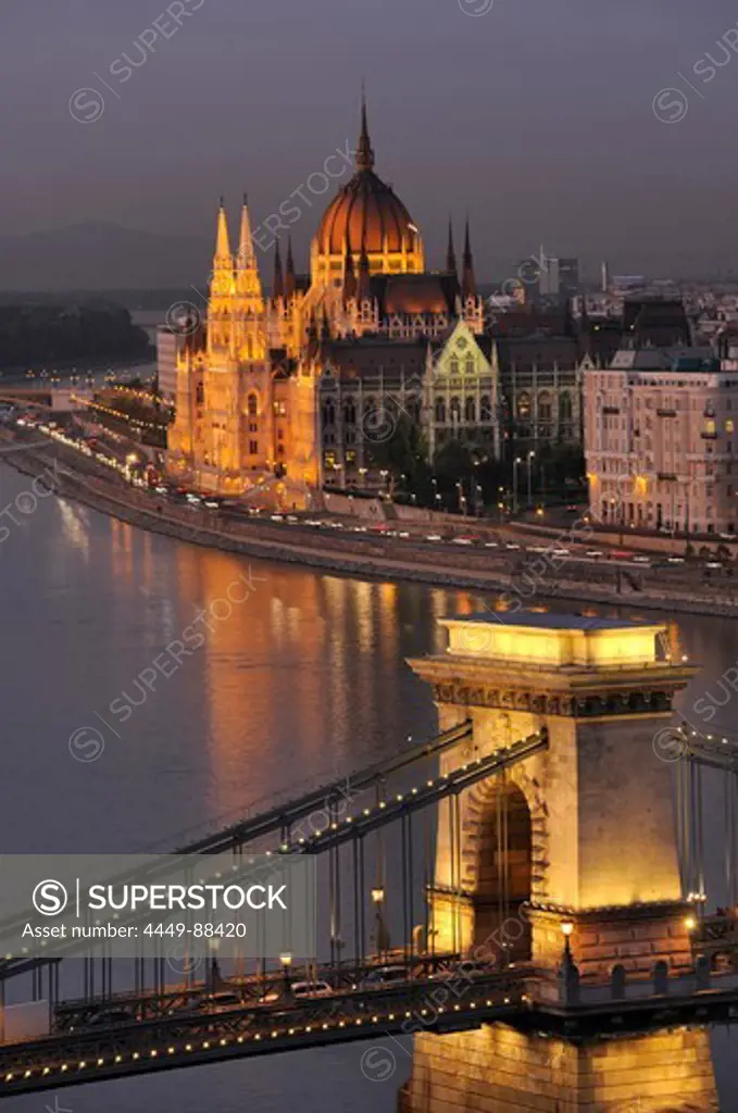 View of Danube river, Chain Bridge and House of Parliament at night, Budapest, Hungary, Europe