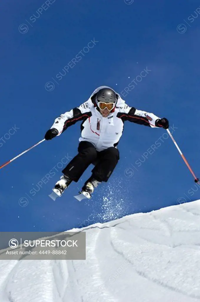 Skier going downhill, South Tyrol, Italy, Europe