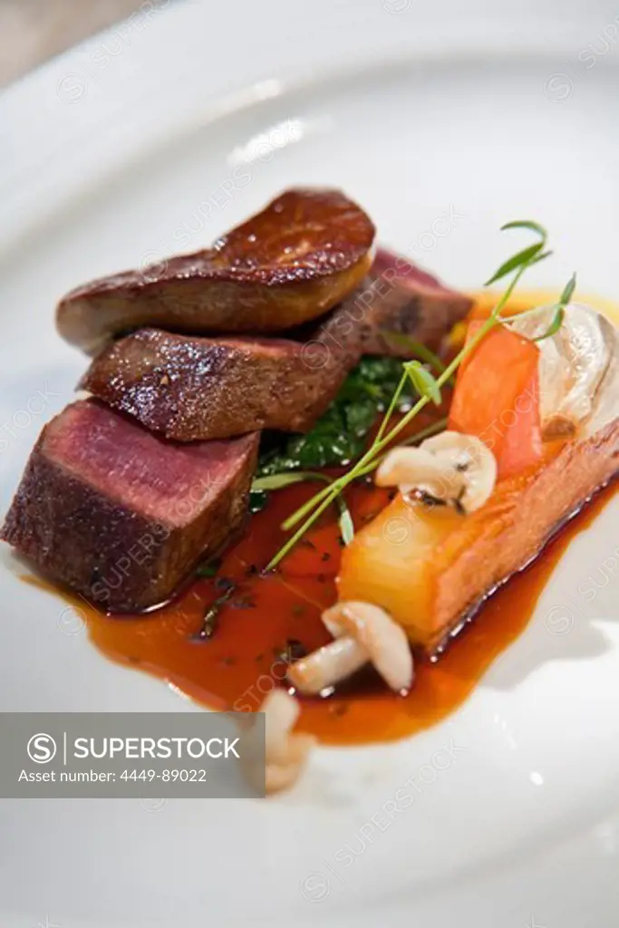 Pan-fried loin of springbok, port and fig jus, pommes fondant“, fricassee of roasted garlic, wild mushrooms and fig, La Colombe, Constantia, Cape Town, Western Cape, South Africa, RSA, Africa