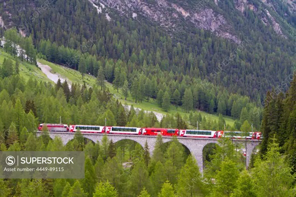 Train, Glacier Express, crossing a viaduct on the Albula line, Albula Valley, Graubuenden, Switzerland