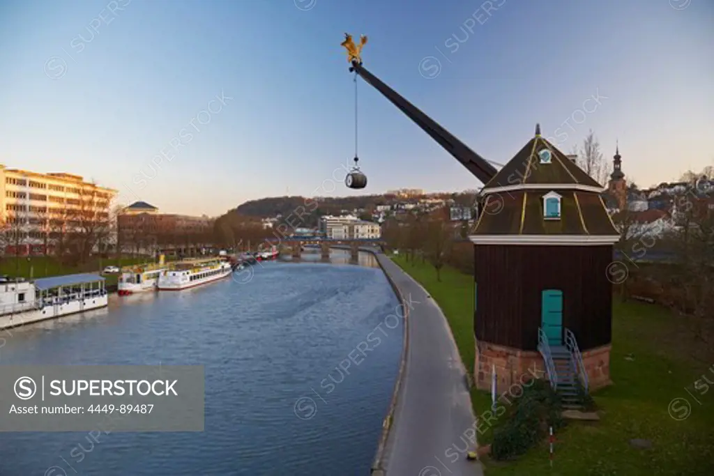 View of crane Saarkran and Old Bridge at the river Saar in the evening, Saarbruecken, Saarland, Germany, Europe