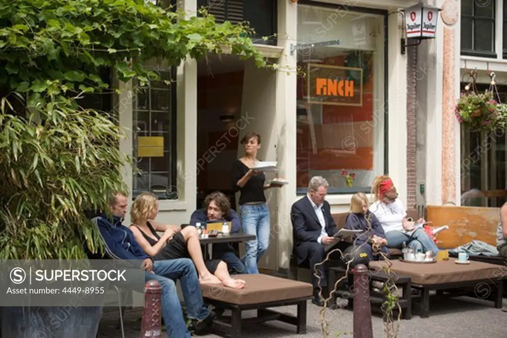 People, Cafe Finch, Jordaan, Waitress serves guests something to eat outside, Cafe Finch, Jordaan, Amsterdam, Holland, Netherlands