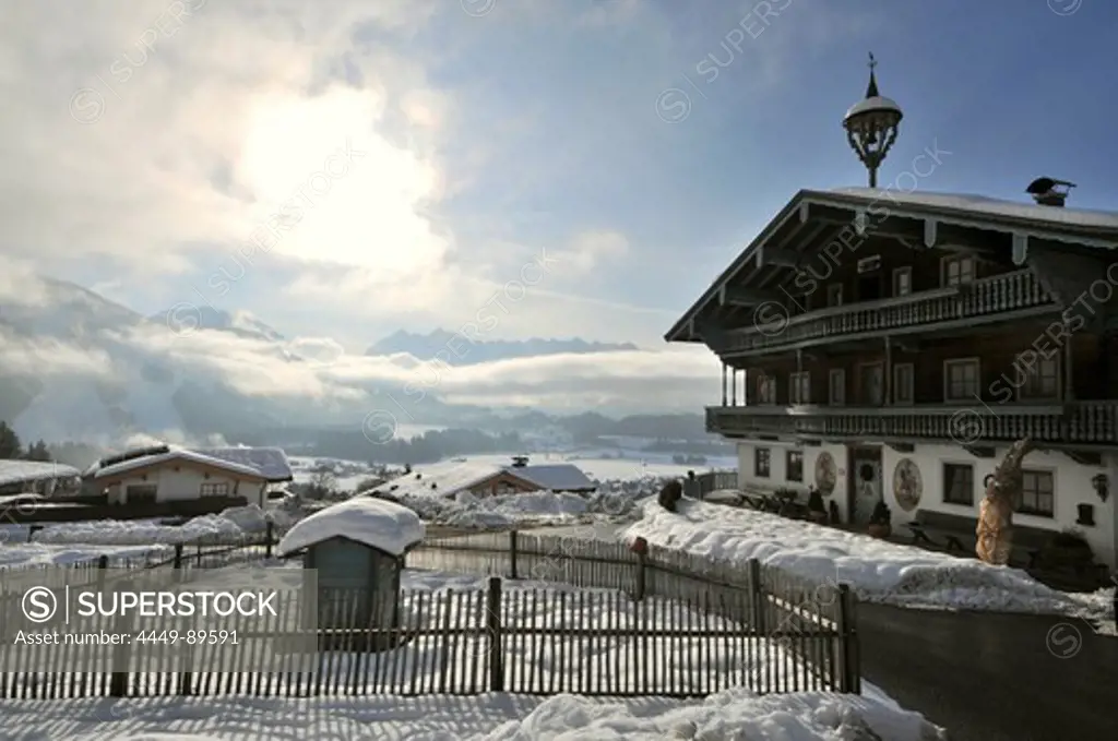 Houses in snowy mountain scenery, Kaiserwinkl, Winter in Tyrol, Austria, Europe