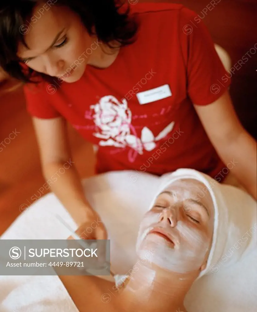 Woman having facial treatment, Spa Resort, Travemuende, Luebeck, Schleswig-Holstein, Germany
