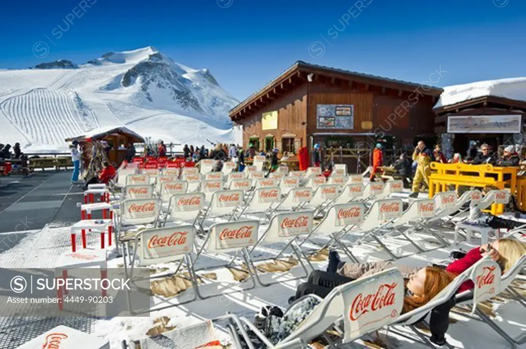 Deck chairs outside a mountain restaurant, Tignes, Val d Isere, Savoie department, Rhone-Alpes, France