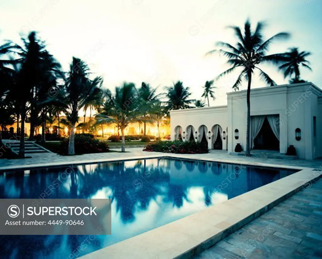 Courtyard with palm trees, Restaurant and Pool of Baraza Spa and Resort in Bwejuu, East Coast, Zanzibar, Tanzania, East Africa