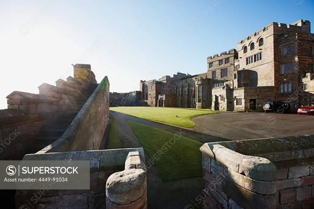 Lawn and driveway in front of Bamburgh Castle, Bamburgh, Northumberland, England, Great Britain, Europe