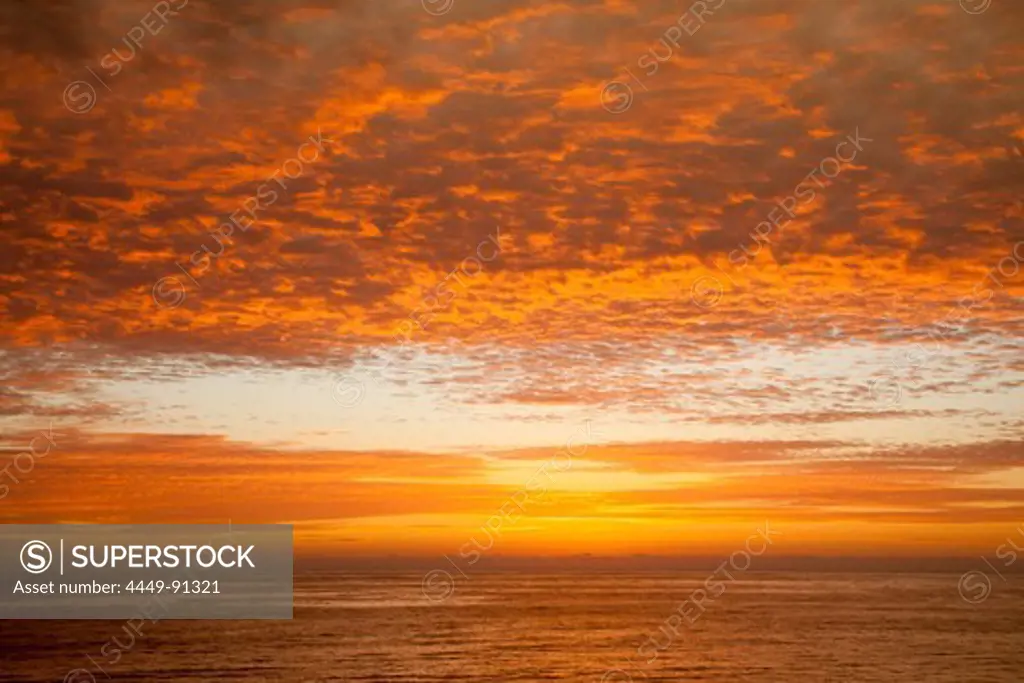 Clouds at sunset, view from the board of the cruise ship MS Germany, Peter Deilmann Reederei, during South American trip, South Pacific Ocean, near Chile, South America