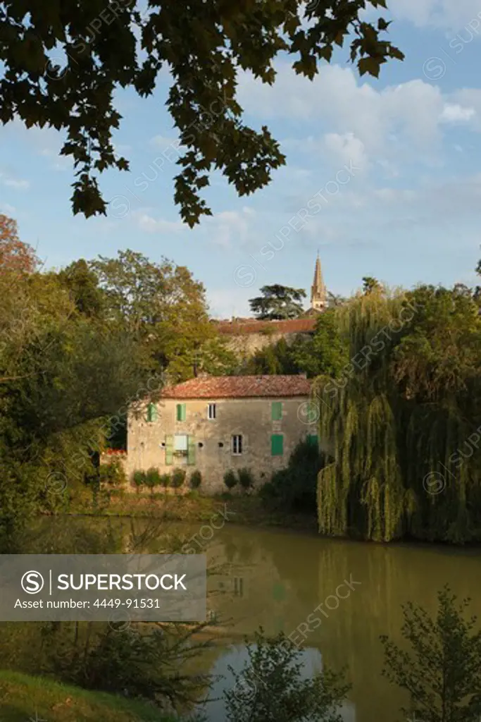 house at the banks of Baise River, spire of Cathedral Sainte-Pierre, cathedral, gothic, Condom, Condom-en-Armanac, Department Gers, Region Midi-Pyrenees, Via Podiensis, Camino de Santiago, St. James Way, France, Europe