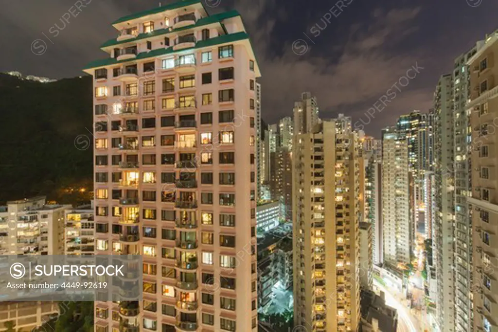 Multi-storey apartment buildings in the Midlevels of Hong Kong Island at night, Hongkong, China, Asia