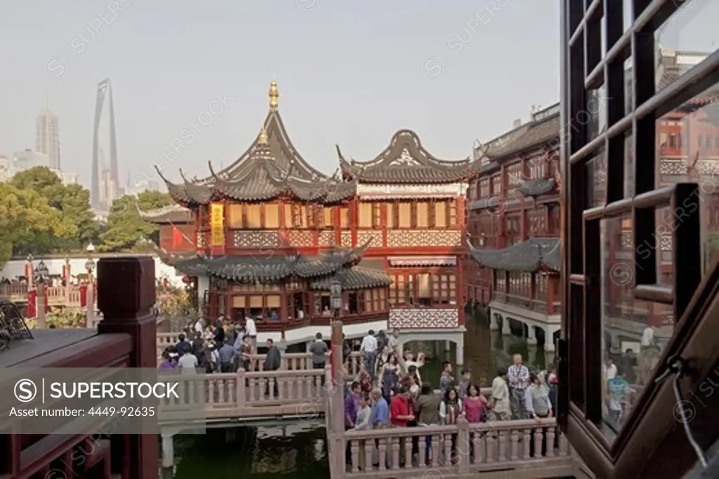 People on a bridge in front of the Huxinting tea house at Yu Yuan Garden, Shanghai, China, Asia