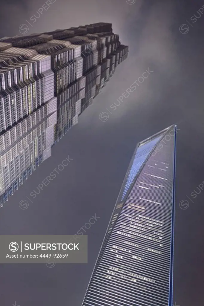 Low angle view of Shanghai World Financial Center and Jin Mao Tower at night, Pudong, Shanghai, China, Asia