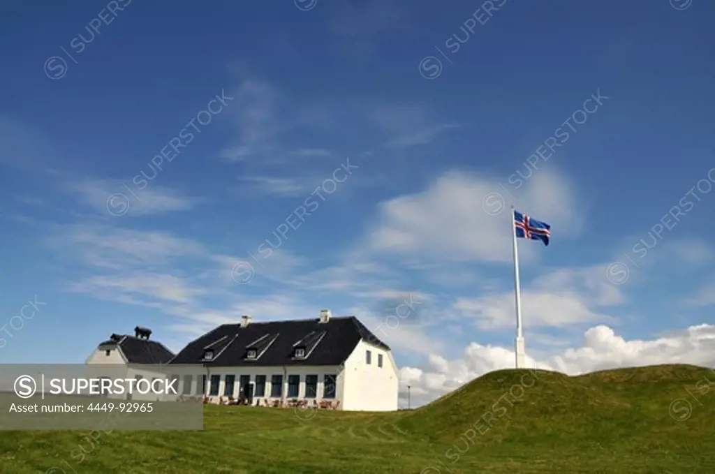 House and flag on the island of Videy near Reykjavik, Iceland, Europe