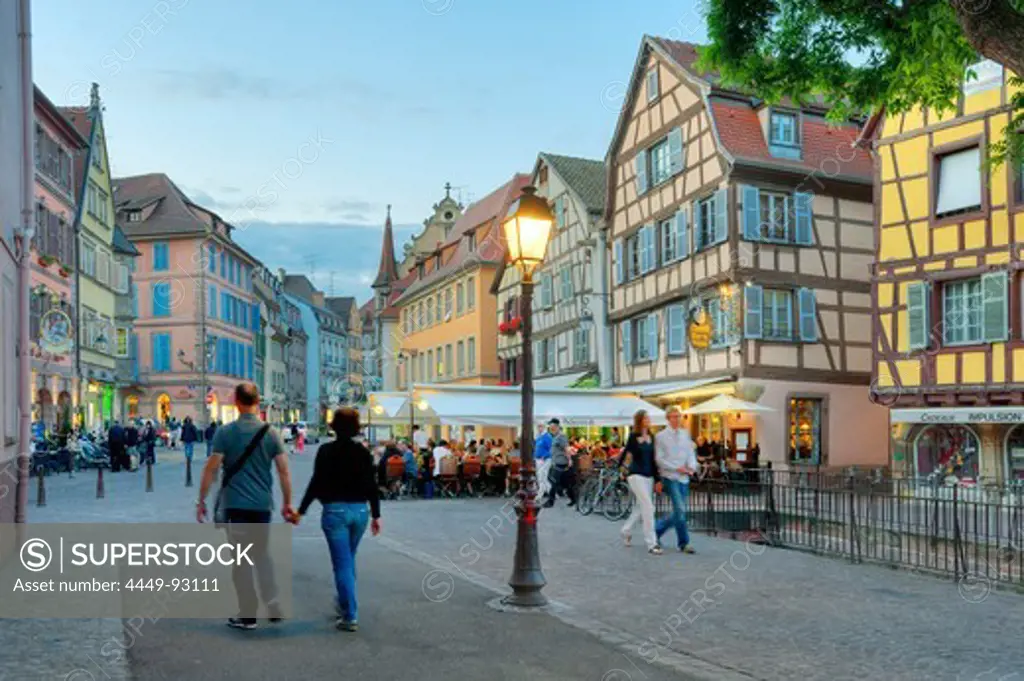 People at the Place de l'Ancienne Douane in the evening, Colmar, Alsace, France, Europe