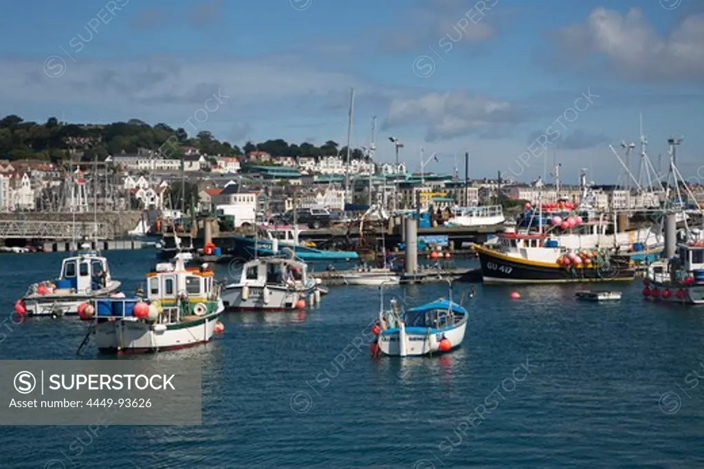 Fishing boats in harbor, St Peter Port, Guernsey, Channel Islands, England, British Crown Dependencies
