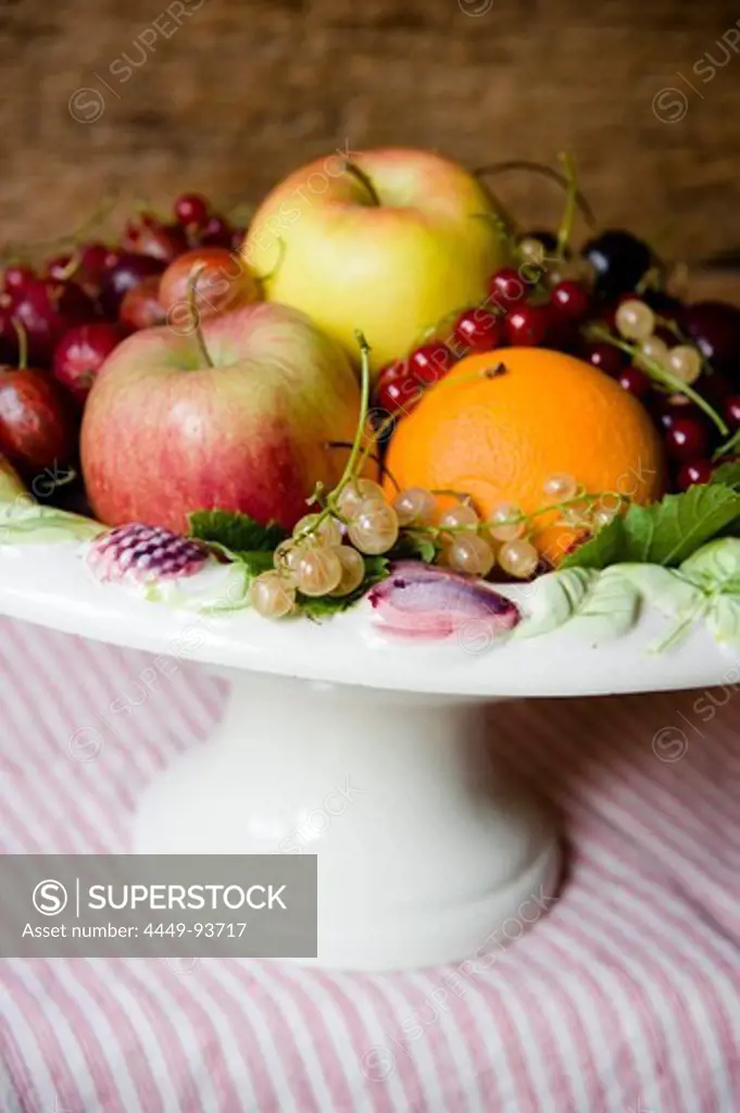 Fruit bowl with apples, oranges and redcurrants, Fruit