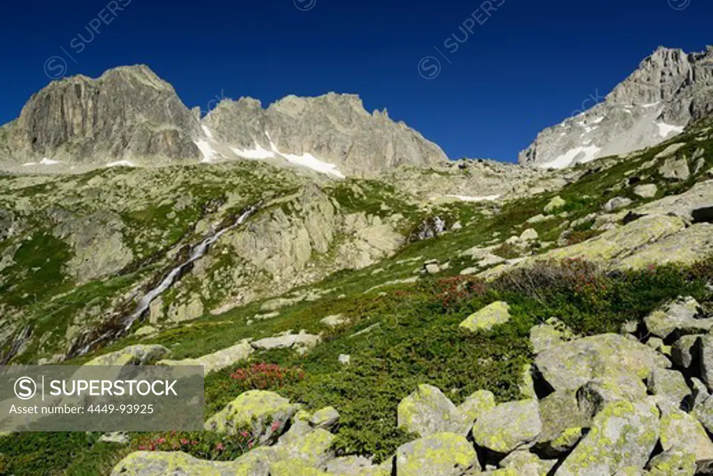 High mountain landscape with boulders and stream, Alpe di Rotondo, Gotthard range, Ticino, Switzerland