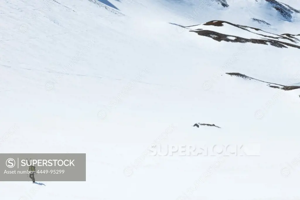 Backcountry skier ascending from Landfriedtal to Gruberscharte, Dachstein Mountain, Steiermark, Austria
