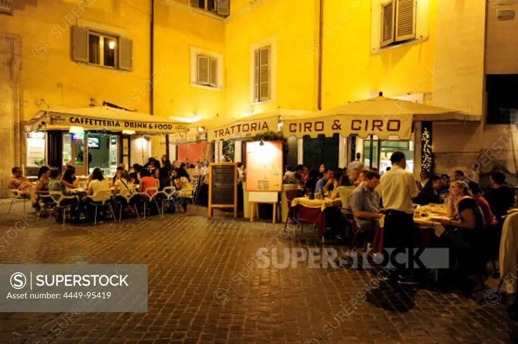Illuminated square with restaurant in the evening, Piazza della Maddalena square, old city centre, Rome, Roma, Italy, Europe