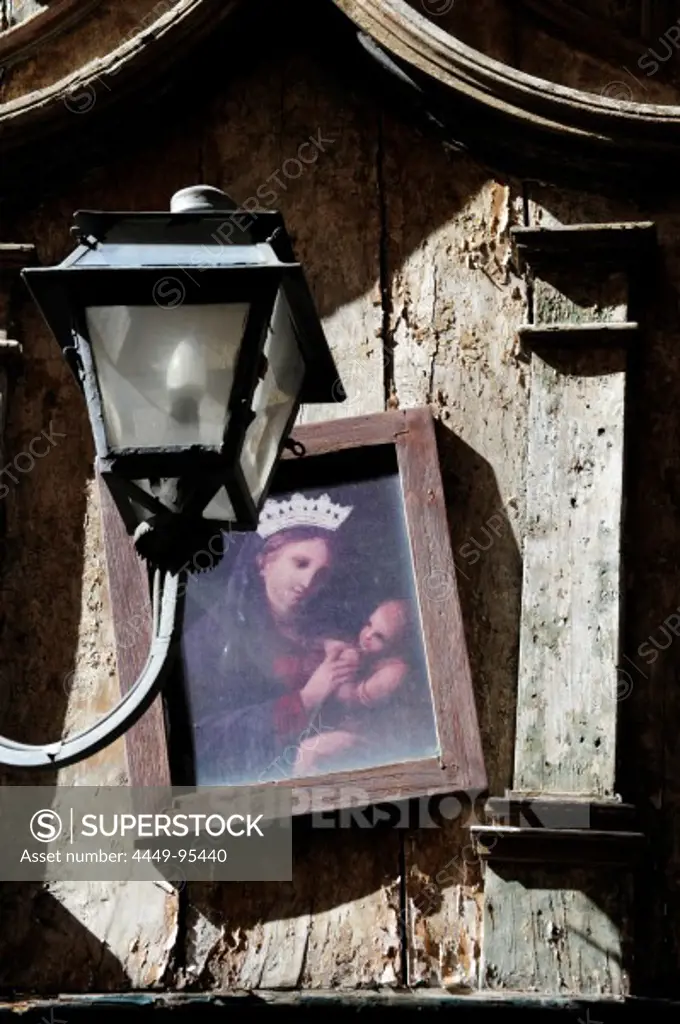 Lantern and image of the Madonna on the wooden facade of a building, old city centre, Rome, Roma, Italy, Europe