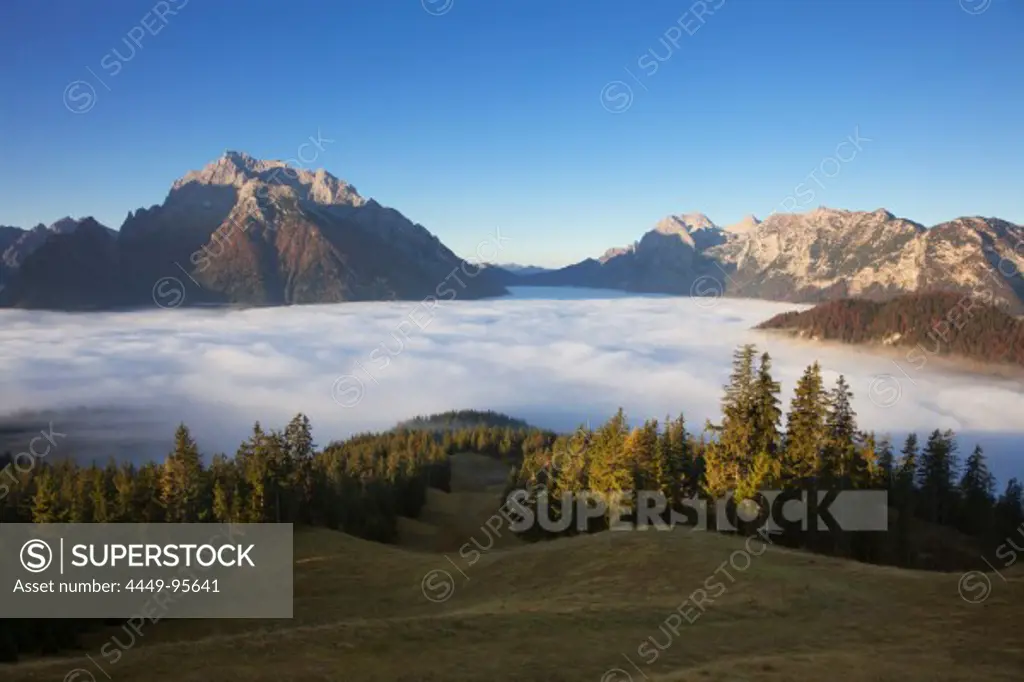 View over the fog in the valley onto Hochkalter and Reiteralpe, Berchtesgaden region, Berchtesgaden National Park, Upper Bavaria, Germany, Europe
