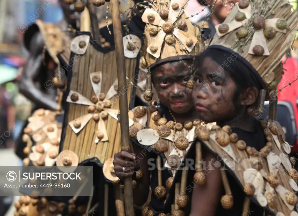 Two children with black smeared faces, Ati Atihan Festival, Kalibo, Aklan, Western Visayas Region, Panay Island, Philippines