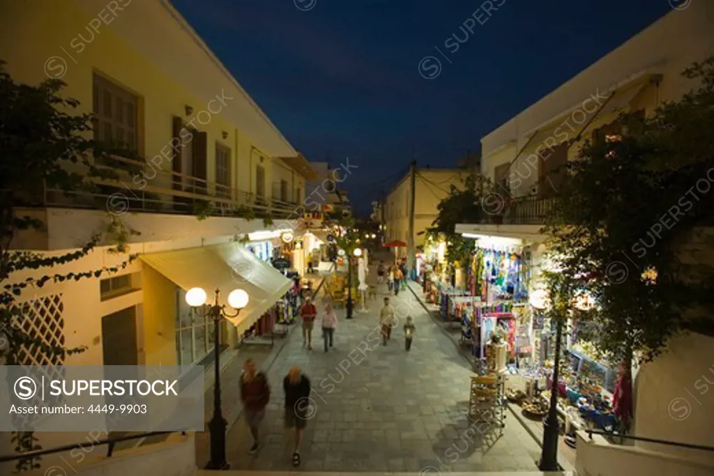 People strolling over shopping street with souvenir shops in the evening, old town, Kos-Town, Kos, Greece