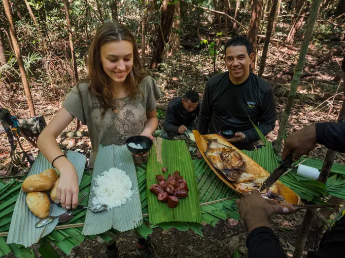 Barbecue during excursion into the rainforest on the Amazon near Manaus, Amazon basin, Brazil, South America