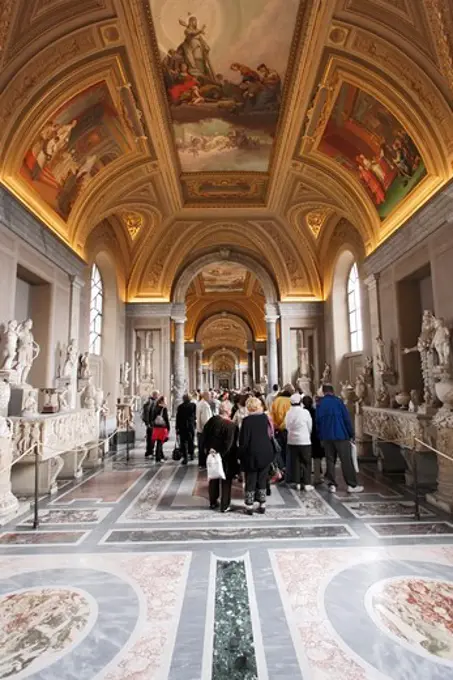 Tourists visiting sculptures, Vatican Museums, Vatican City, Rome, Italy
