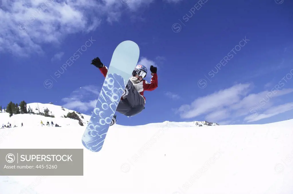 Snowboarder in mid air, Mammoth Mountain Ski Area, California, USA