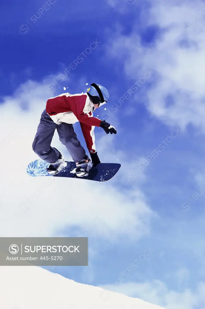 Snowboarder in mid air, Mammoth Mountain Ski Area, California, USA