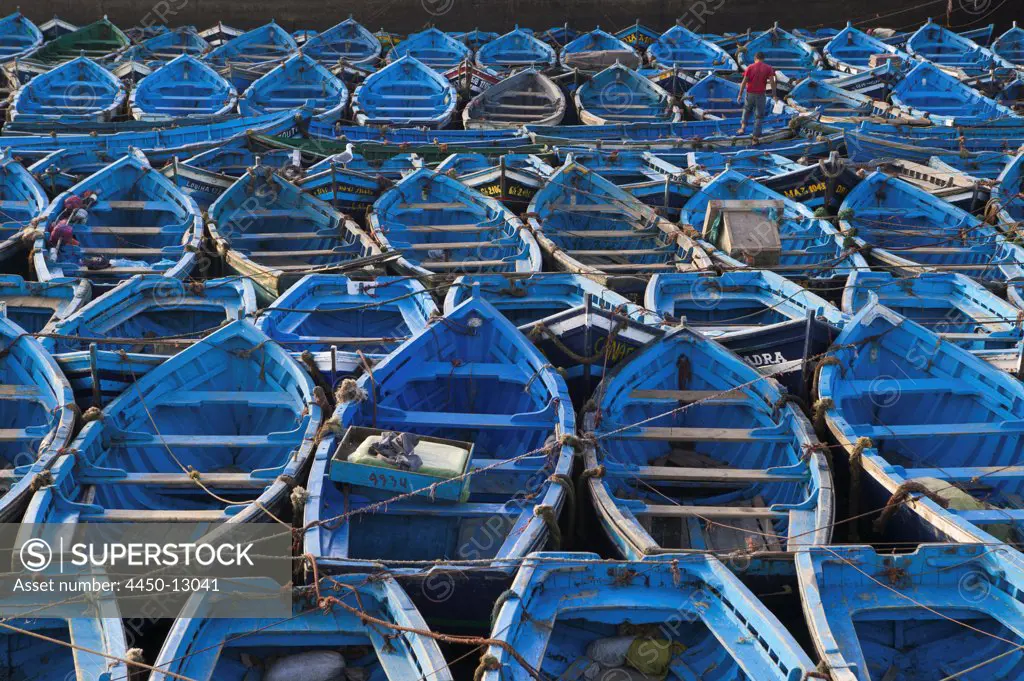 Boats moored very close together in the harbor of Essaouira, Morocco. December 10, 2003