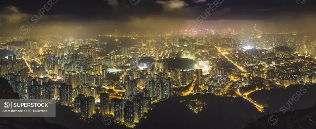 Hong Kong island seen from the hills, lit up at night.