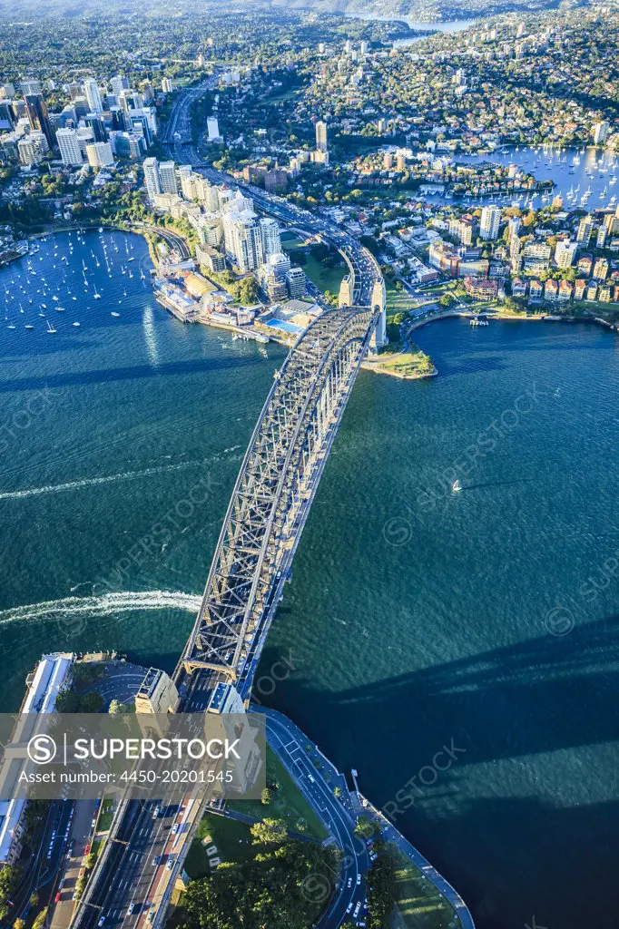 View from above of the Sydney Harbour Bridge and the city of Sydney, downtown and waterfront.