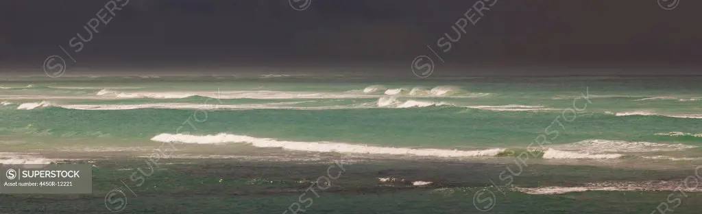 View across the Southern Ocean from Cape Agulhas in South Africa. Waves and stormy seas.  Cape Agulhas, South Africa,