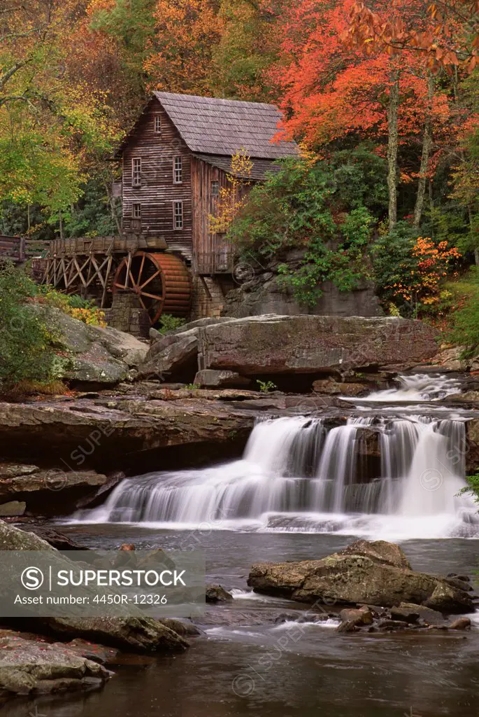 A historic grist mill building on the banks of Glade Creek in West Virginia.  Glade Creek, West Virginia, USA