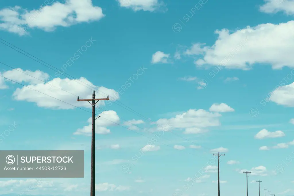 Telephone poles, power lines and cloudy sky, near Quincy Quincy, Grant County, Washington, USA