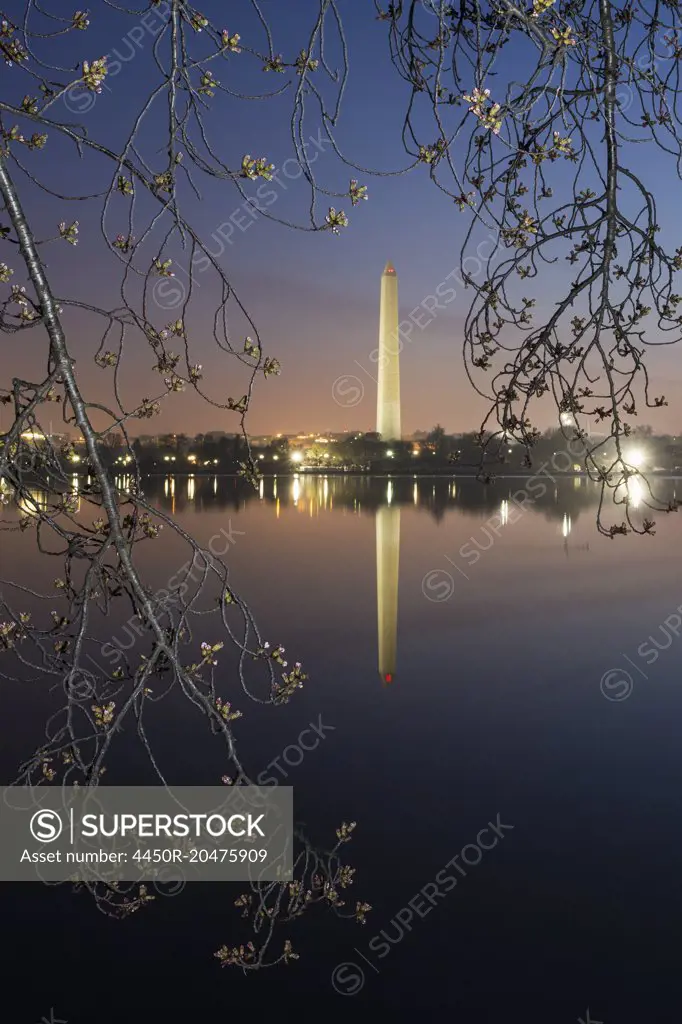 Washington Monument at dawn reflected in the lake.