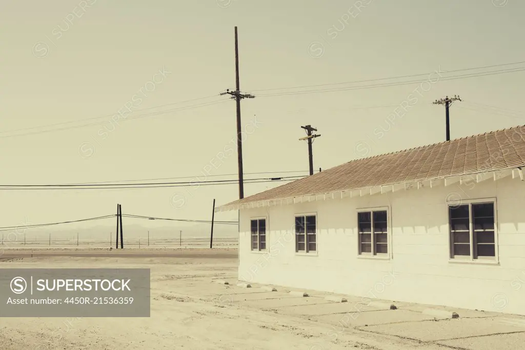 Abandoned building along rural, desert road, Trona, California
