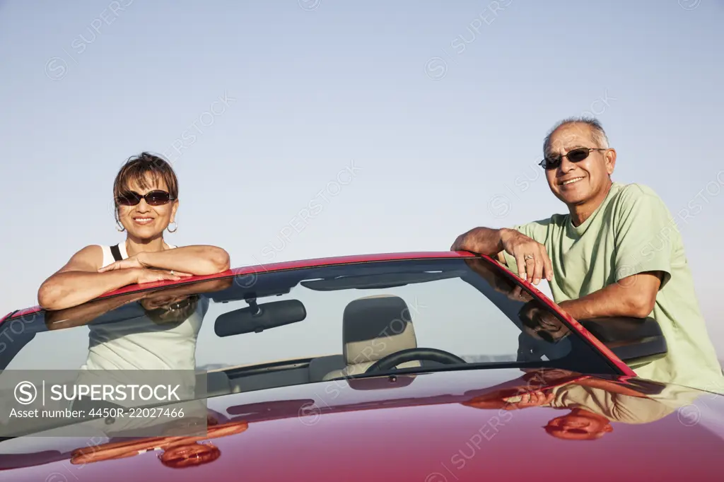 A hip senior Hispanic couple on a road trip in eastern Washington State, USA.