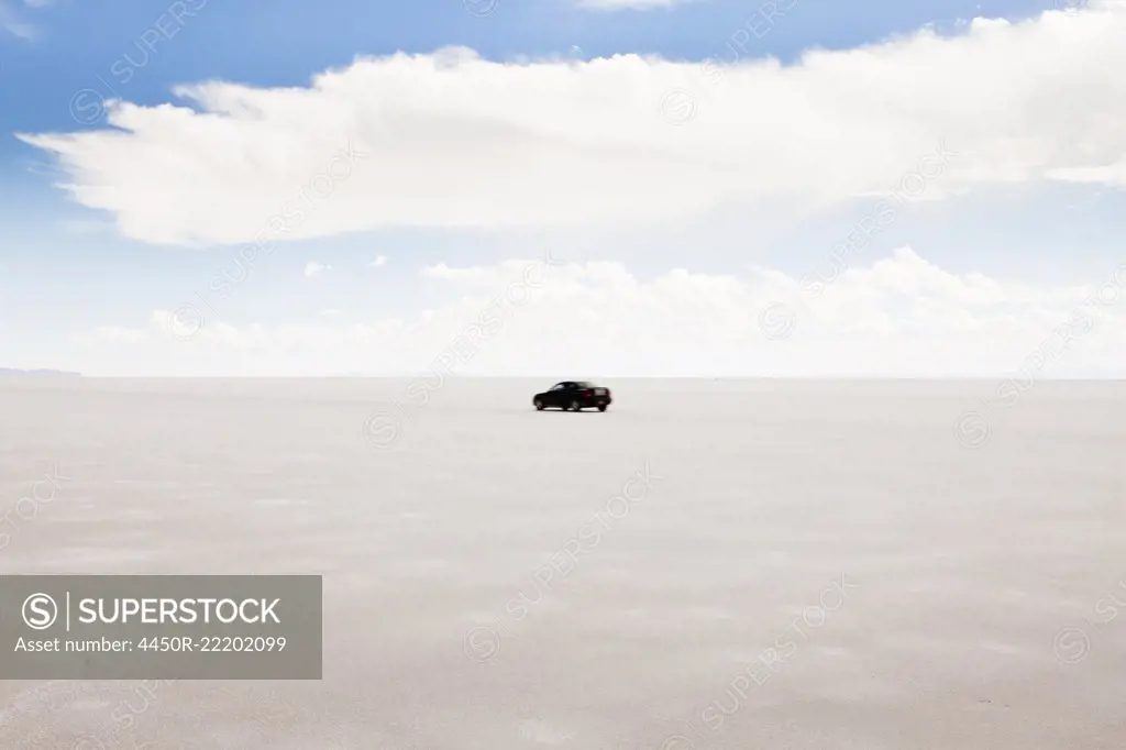 Car Driving on the Utah Salt Flats