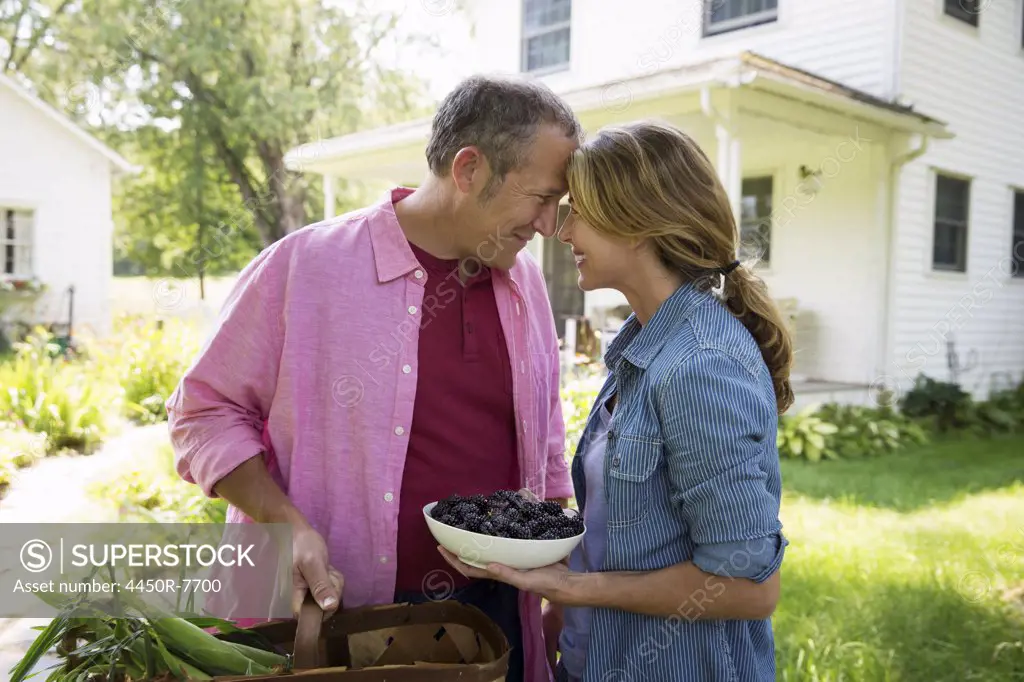 A family summer gathering at a farm. A shared meal, a homecoming.