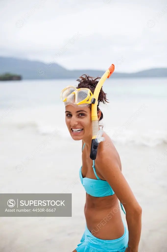A young woman wearing snorkelling gear on the Samana Peninsula in the Dominican Republic. Samana Peninsula, Dominican Republic. 4/6/2011