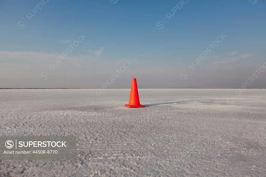 Traffic cone track marker on Bonneville Salt Flats, during Speed Week. Bonneville Salt Flats, Utah, USA. 8/12/2012