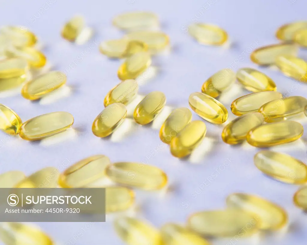Fish oil providing Omega-3, in softgel supplement capsules.  An essential fatty acid and health supplement product.  10/10/2012