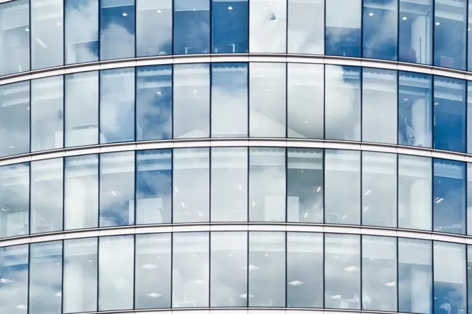 Clouds Reflecting in the windows of an Office Building