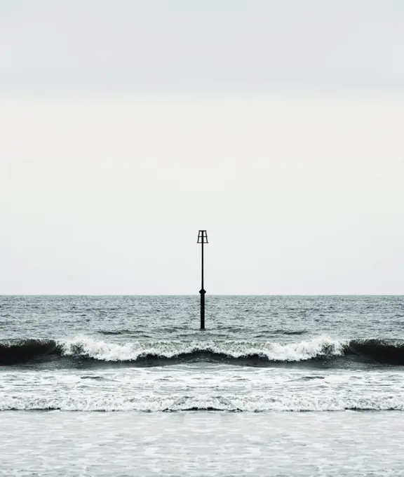 Beacon and Ocean Waves