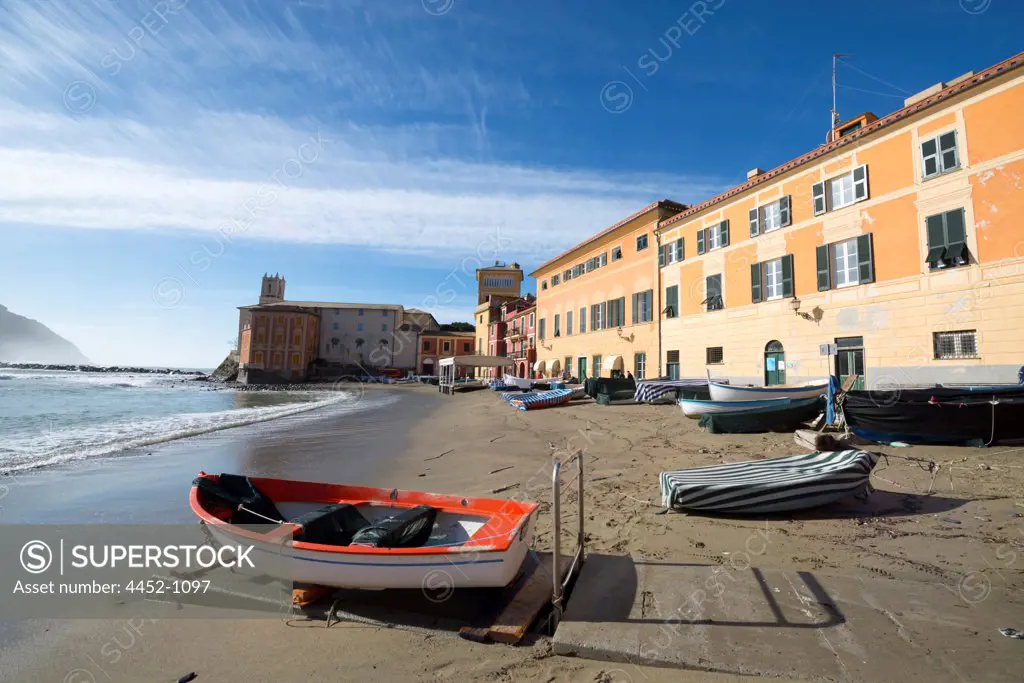 House and Boat on the Sand Beach in Sestri Levante, Liguria, Italy.