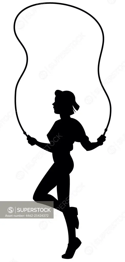 Silhouette of woman on jump rope